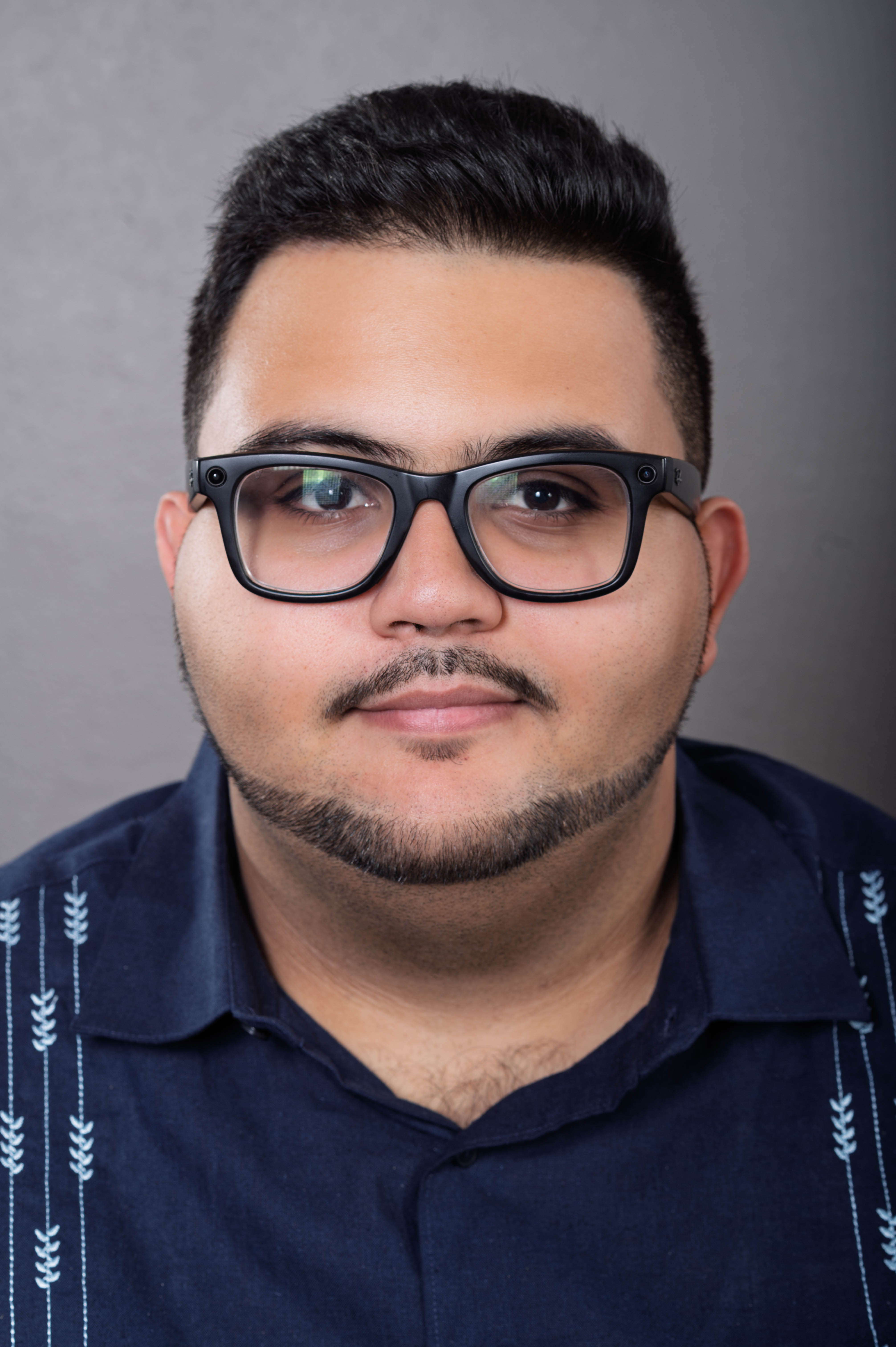 Bryan Pabon standing outdoors