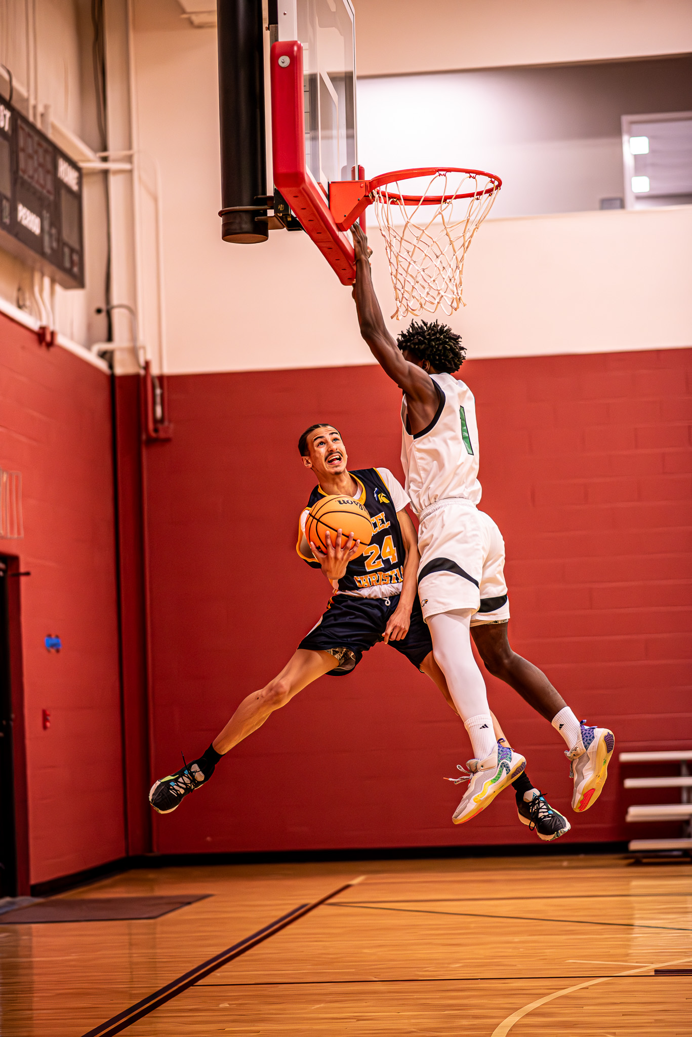 Basketball player blocking a shot